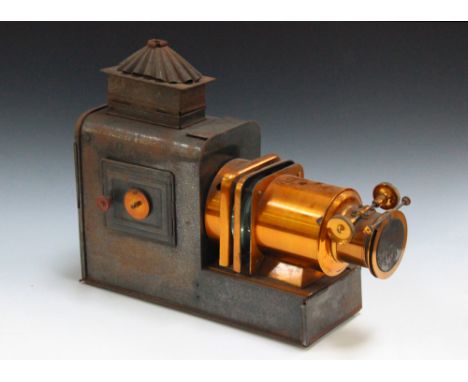 A late 19th Century magic lantern, bearing manufacturer's label marked 'Walter Tyler's New Pattern Helioscopic Lantern', toge