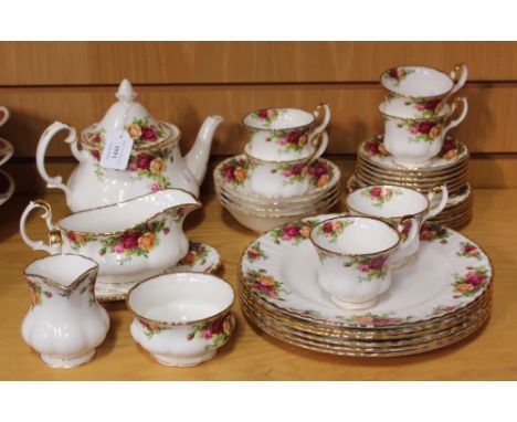 A Royal Albert 'Old Country Roses' pattern part service, comprising teapot and cover, sauce boat and stand, four breakfast bo