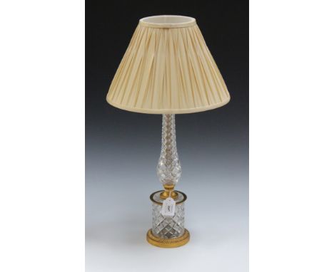 A 20th Century cut glass and gilt cast metal table lamp with a baluster stem and circular base, height approx 40cm.