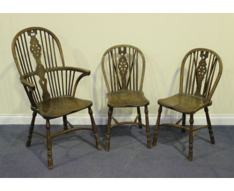 A 20th Century ash Windsor armchair, the stick and wheel back above a crinoline stretcher, width approx 58cm, together with a