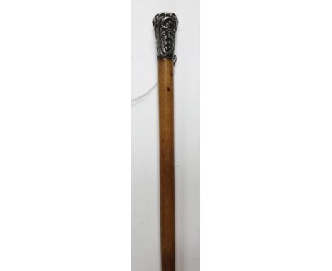 A 19th Century rhino horn riding crop, the tapering shaft with an applied silver cap decorated with foliate scrolls, length a