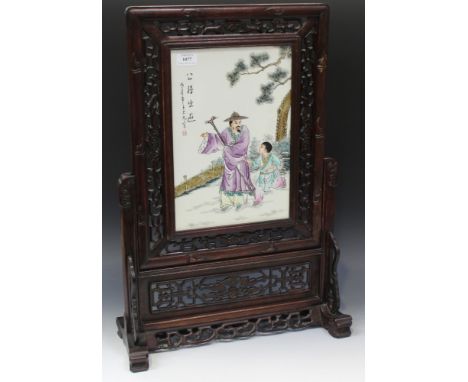 A Chinese hardwood framed porcelain rectangular table screen and hardwood stand, 20th Century, the famille rose porcelain pan