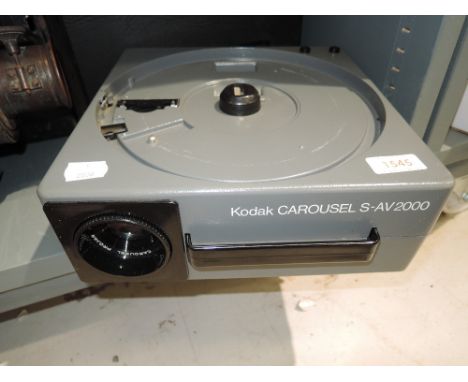 A cased Kodak Carousel S-AV2000 slide projector