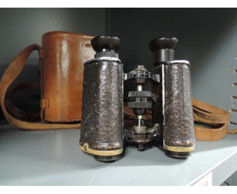 A pair of CP Goerz, Berlin Trieder army binoculars in original leather case