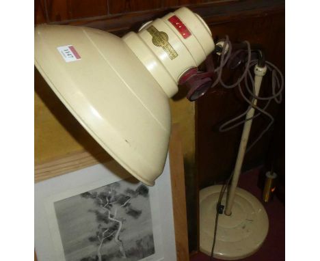 A mid 20th century floor standing lamp by Barber Electrical Services Ltd of Birmingham, having rise and fall action