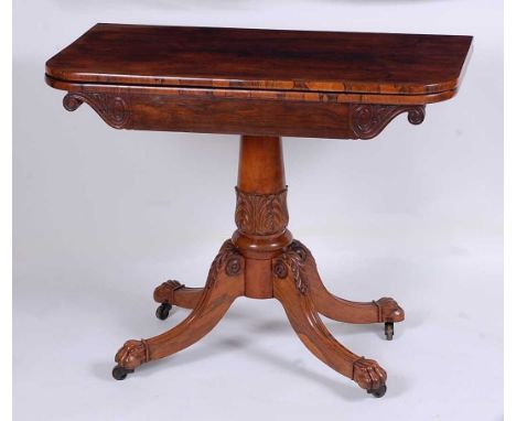 A George IV rosewood pedestal card table, the D-shaped fold-over top with swivel action, opening to reveal baize lined playin