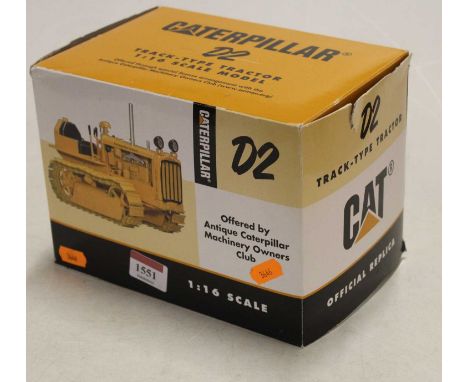 A Speccast Toy Farmer release 1:16 scale diecast model of a Caterpillar D2 tractor, housed in the original box