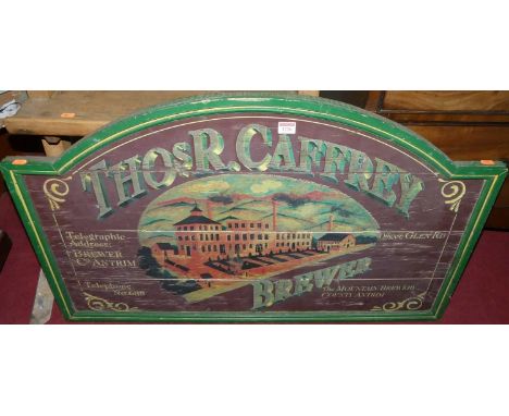 A reproduction painted wooden sign for Thomas R Caffrey of County Antrim, w.97cm 