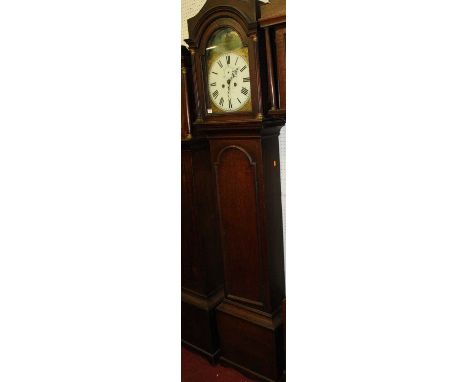 A circa 1830 oak longcase clock having an unsigned 12" painted arch dial, subsidiary seconds dial, brass eight day weight dri