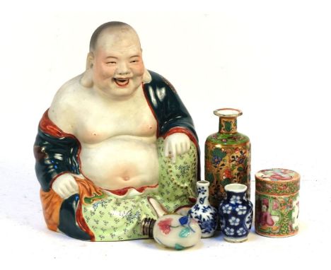 A Peking glass snuff bottle, 20th century, with flower, a ceramic Budai with green robe, a Canon famille rose cylindrical box