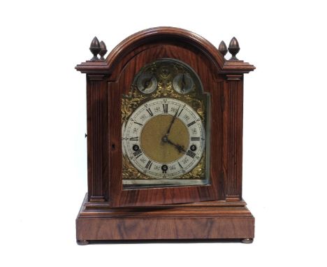 An early 20th century German walnut bracket clock, with three train quarter striking movement with 5 gongs. Stamped 'Lenzkirc