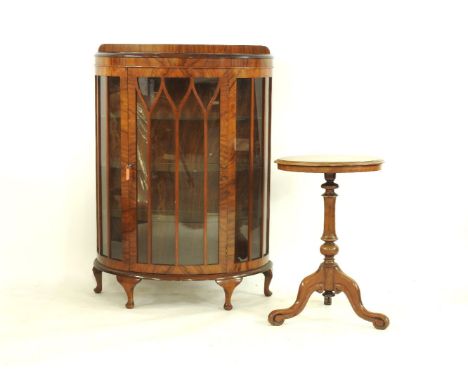 A mid 20th century walnut demi lune display cabinet,  together with a late Victorian circular occasional table, on carved tri