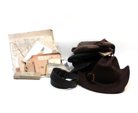 A collection of militaria, RAF cap, maps and ephemera, US Army Carlisle first aid dressing, German belt, fire axe, Hermann Go