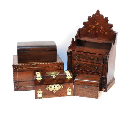 An early 20th century table top chest of three drawers, with inlaid decoration and raised back, together with a walnut writin