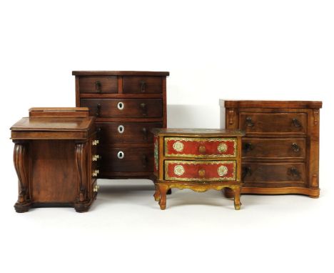 Four miniature furniture items, two chests, 20.5 x 20cm, a Davenport, 14cm, and a painted commode, 19cm wide