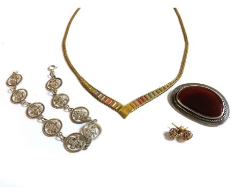 A three colour gold 'v' shaped necklace, with engraved initial K to centre plaque, marked kt9, a silver thistle link bracelet