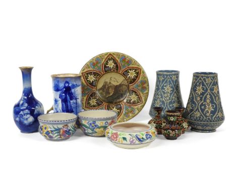Thun pottery, a dish with incised border, centred with an alpine scene, 25.5cm diameter, a pair of pottery vases, incised wit