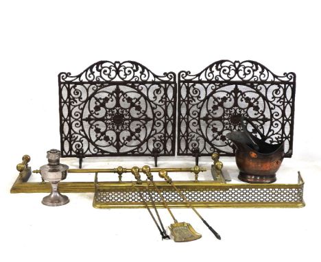Fire screens, fire irons two brass fenders, a coal bucket and an oil lamp (qty)