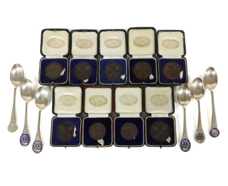 A collection of sporting memorabilia, to include six hallmarked silver presentation tennis spoons, seven Wimbledon umpire med