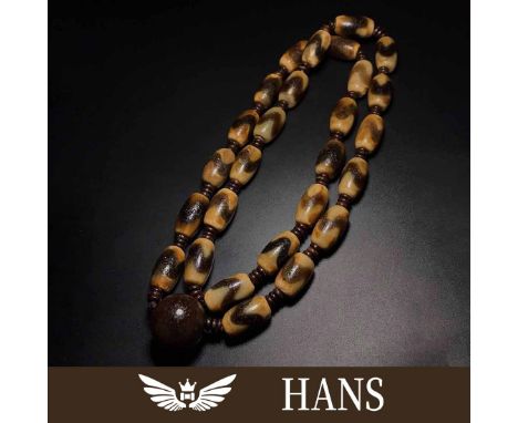 Oily, old and full of weathering. Tiger Tooth Dzi Bead: A bead that exorcises evil spirits. Tiger Tooth is famous for its pow