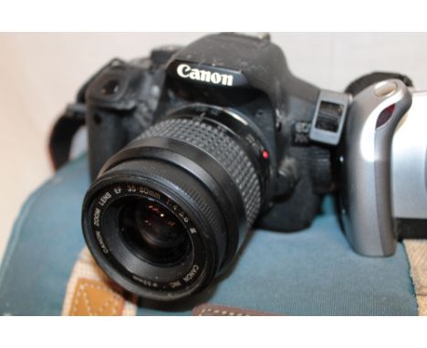 A Canon EOS 700d camera with numerous lenses and accessories and a Canon EOS 300v camera etc.