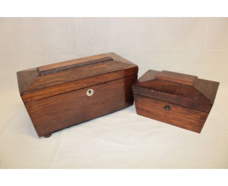 A 19th century rosewood sarcophagus-shaped tea caddy (minus interior fittings) and one other smaller rosewood tea caddy (2)