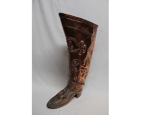 An unusual copper stick stand in the form of a Cavalry boot, 24" high