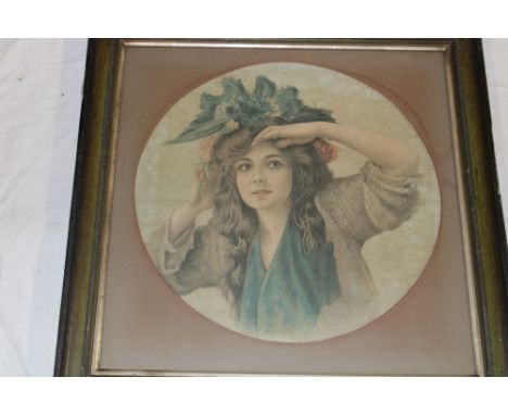 An Edwardian coloured engraving on fabric depicting a bust portrait of a female, frame and glazed