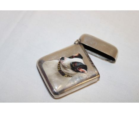 A late 19th century silver rectangular vesta case with applied dog portrait, London marks 1895
