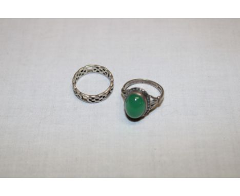 A silver dress ring set jade and one other silver Celtic-style wedding band (2)