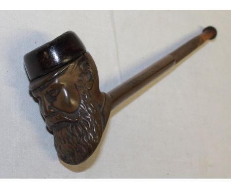 An unusual Centuplico cricketing smoker's pipe in the form of W. G. Grace marked "WGG AE t.47 ad1895"