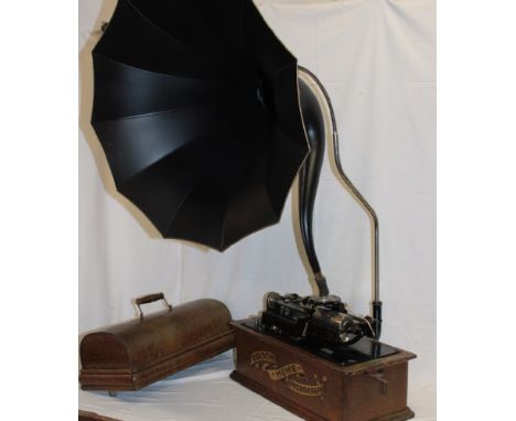 An Edison Home phonograph in domed oak case together with original horn, mounts and brackets
