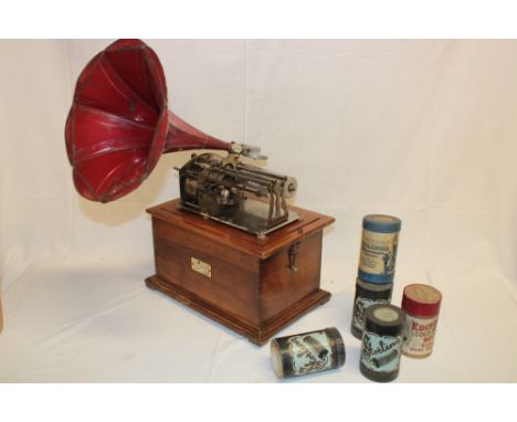 An unusual Cleopatra Reproducer Phonograph in walnut fitted case together with metal horn and a selection of boxed cylinders