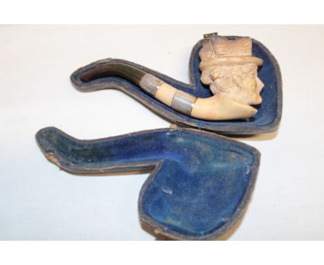 An old meerschaum silver-mounted smoker's pipe in the form of a female's head with hat in velvet lined case (af)