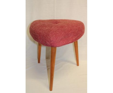A 1960's Ercol triangular dressing stool with fabric upholstered seat