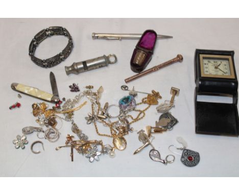 A selection of various costume jewellery, cuff-links, gilt propelling pencil, cased silver thimble, small travelling clock et