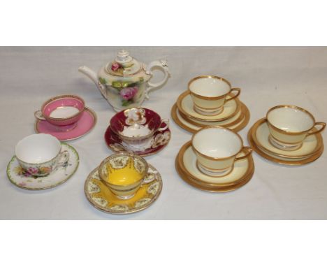 A selection of various Royal Worcester tea ware including four decorative tea cups and saucers, tapered tea pot with painted 