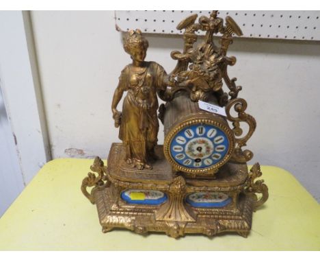 A FRENCH STYLE GILT METAL AND ENAMEL MANTLE CLOCK 