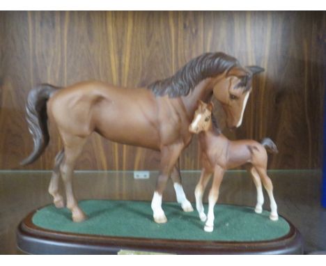 A ROYAL DOULTON CERAMIC MARE AND FOAL STUDY ENTITLED 'FIRST BORN' - MARKED AS A SECOND