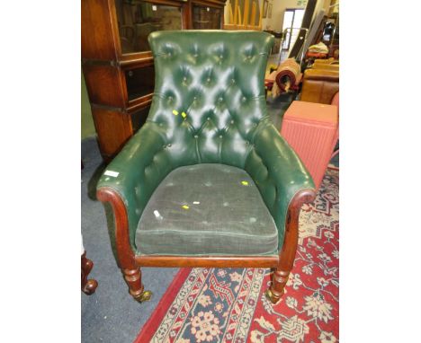 A 19TH CENTURY MAHOGANY LIBRARY ARMCHAIR WITH LEATHER BUTTON BACK UPHOLSTERY