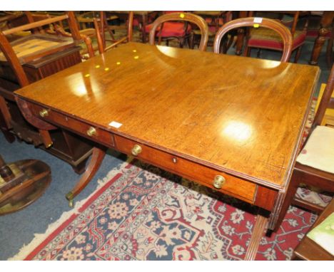 AN ANTIQUE MAHOGANY SOFA TABLE