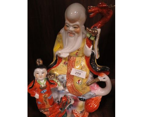 A MODERN CERAMIC TABLEAU OF A CHINESE DEITY