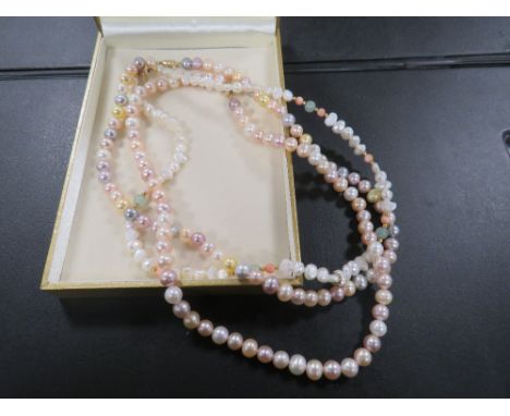 THREE MODERN PEARL NECKLACES , ONE WITH 9CT GOLD CLASP ANOTHER WITH 14 K CLASP