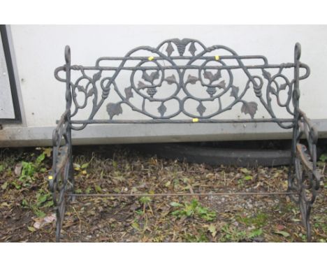A CAST IRON GARDEN BENCH FRAME