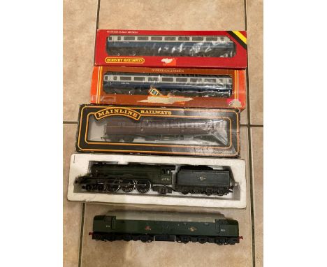 A BOXED FLYING SCOTSMAN STEAM LOCOMOTIVE AND TENDER, UNBOXED LIMA DIESEL LOCOMOTIVE TOGETHER WITH THREE BOXED CARRIAGES