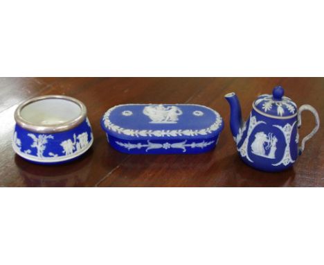 Three early miniature Wedgwood jasperware items to include a teapot, salt cellar with sterling silver rim and a lidded trinke