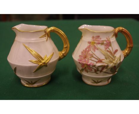 Two Royal Worcester blush ivory jugs handpainted, 8.5cm high (tallest) approx.