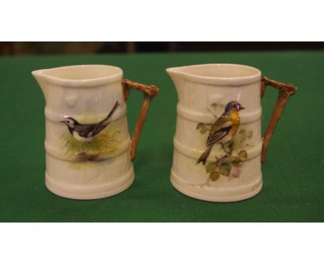 Two Royal Worcester Powell bird jugs handpainted, both signed H. Powell, 7cm high approx.
