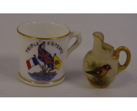 Royal Worcester handpainted bird miniature jug together with a Royal Worcester miniature souvenir mug, H4cm approx