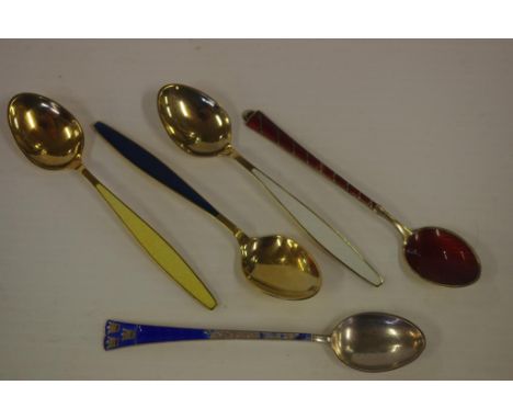 Three Georg Jensen silver & enamel coffee spoons together with two other silver & enamel coffee spoons